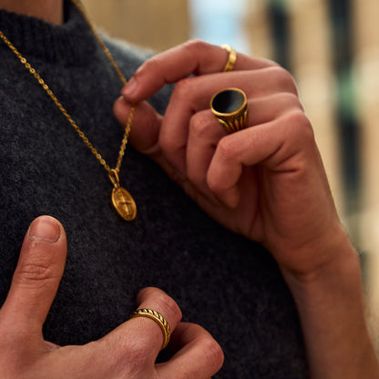 Black stone signet ring (gold)